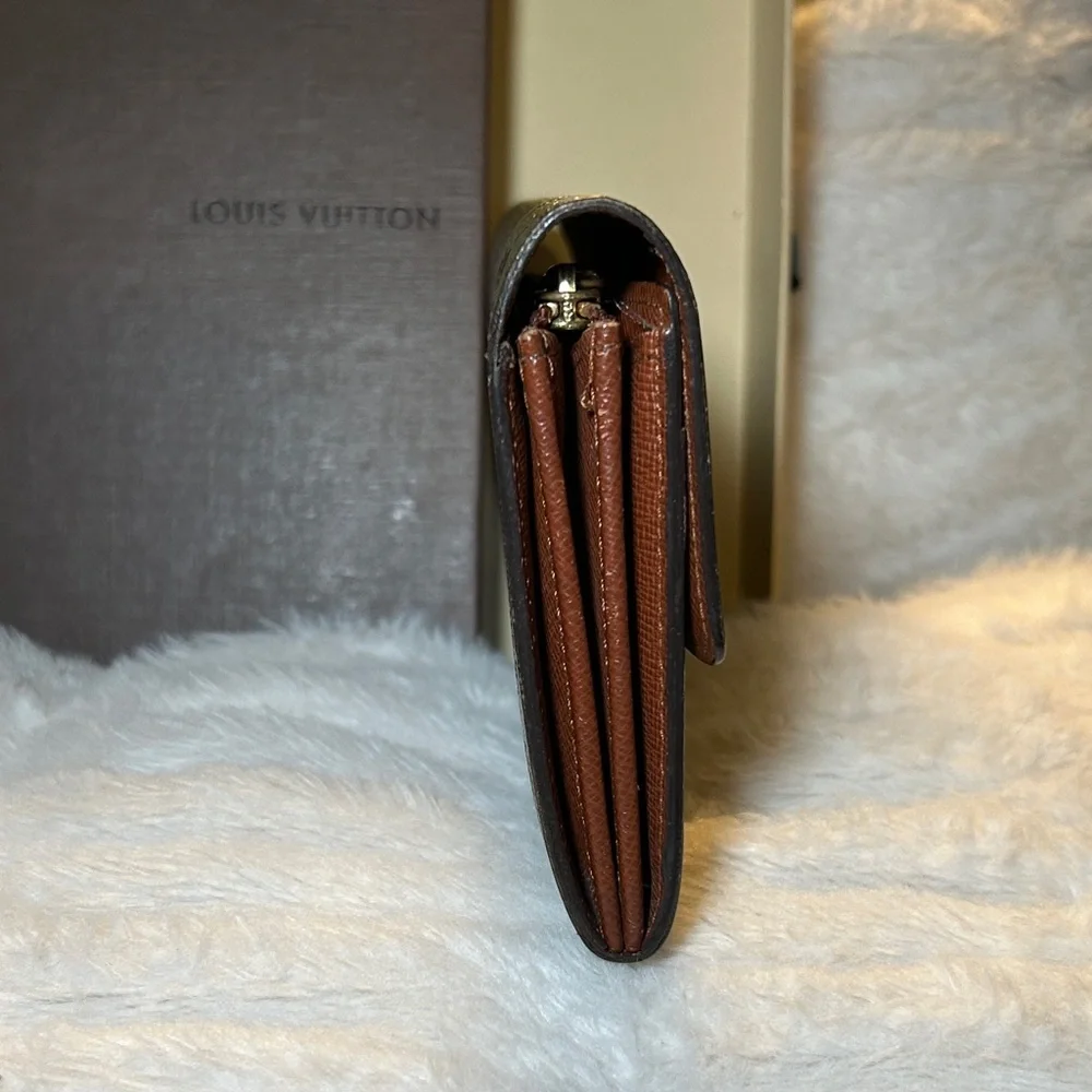 338. Louis Vuitton Limited Edition Monogram Graffiti Sarah Wallet,